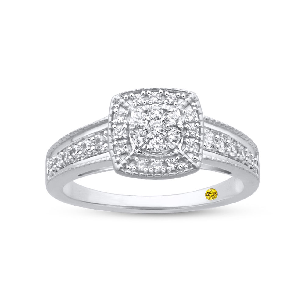 What stands out most in the vintage-inspired halo ring design?